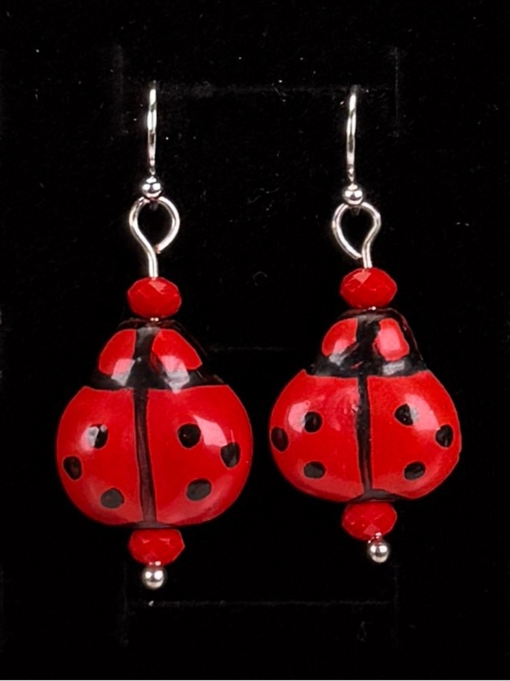 Silvertone, lightweight, red and black ladybug pierced earrings